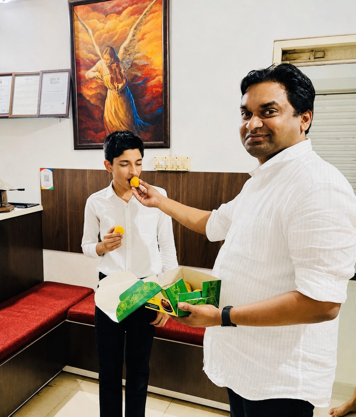 A student being presented with an award at the academy